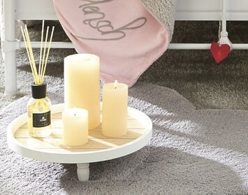 Sviece a svietniky – univerzálne doplnky, ktoré dotvoria atmosféru